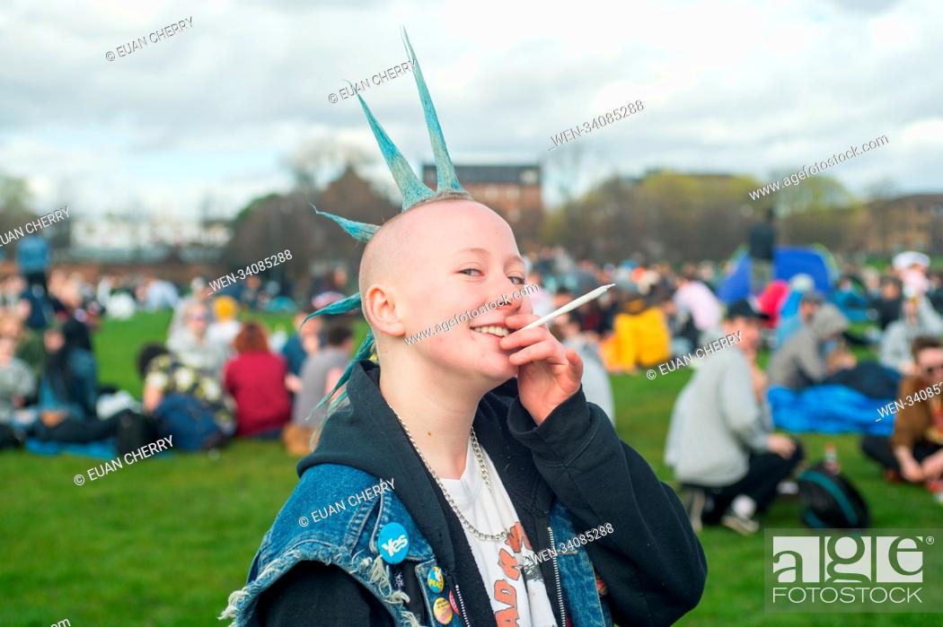 Stock Photo: Cannabis smokers celebrate 4/20 on Glasgow Green with joints and bongs. Featuring: April May Thomson Where: Glasgow, United Kingdom When: 20 Apr 2018 Credit:.