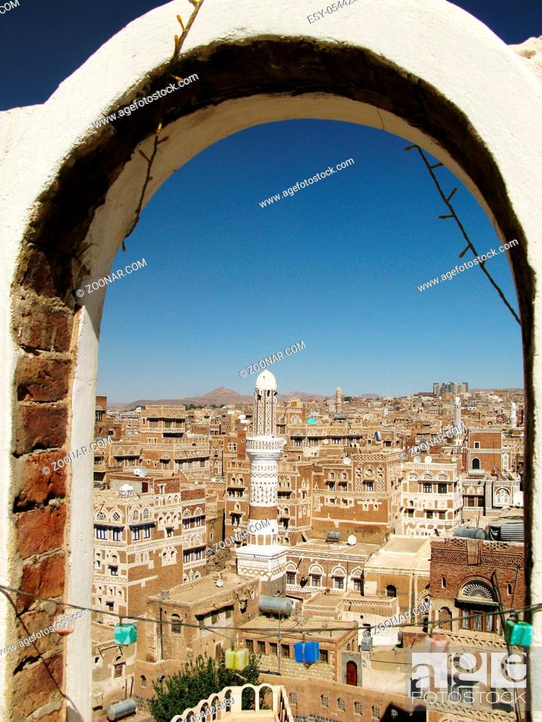 Stock Photo: Aerial view of Sanaa old city through arch, Yemen.