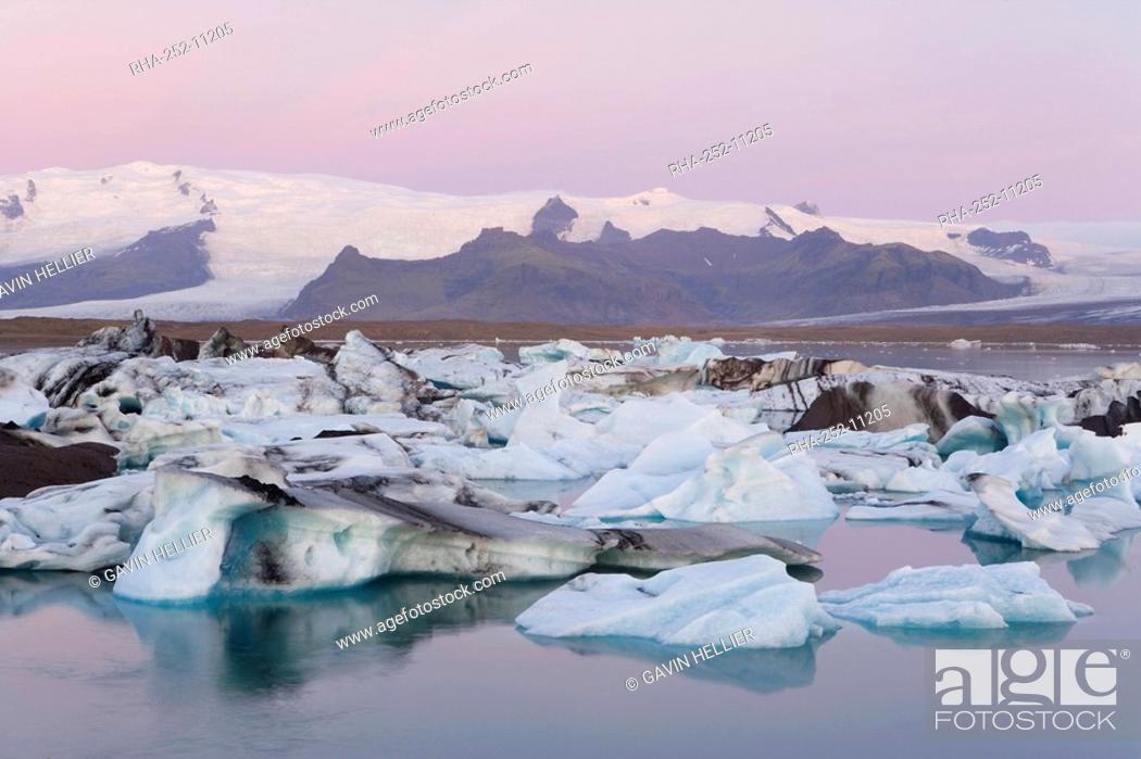 Stock Photo: Icebergs floating in the Lagoon beneath Breidamerkurjokull Glacier, Jokulsarlon Glacial River Lagoon, southern Vatnajokull, southern area, Iceland.
