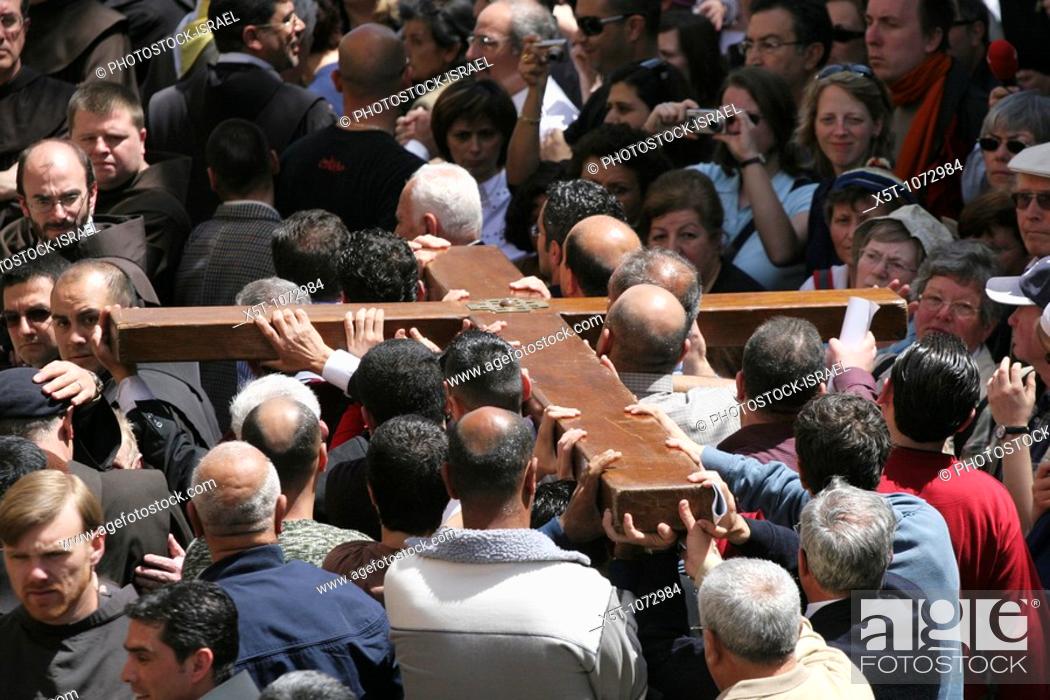 Stock Photo: Israel, Jerusalem The Via Dolorosa Procession, Good Friday, Easter 2007 the crowd bearing a crucifix during the procession.