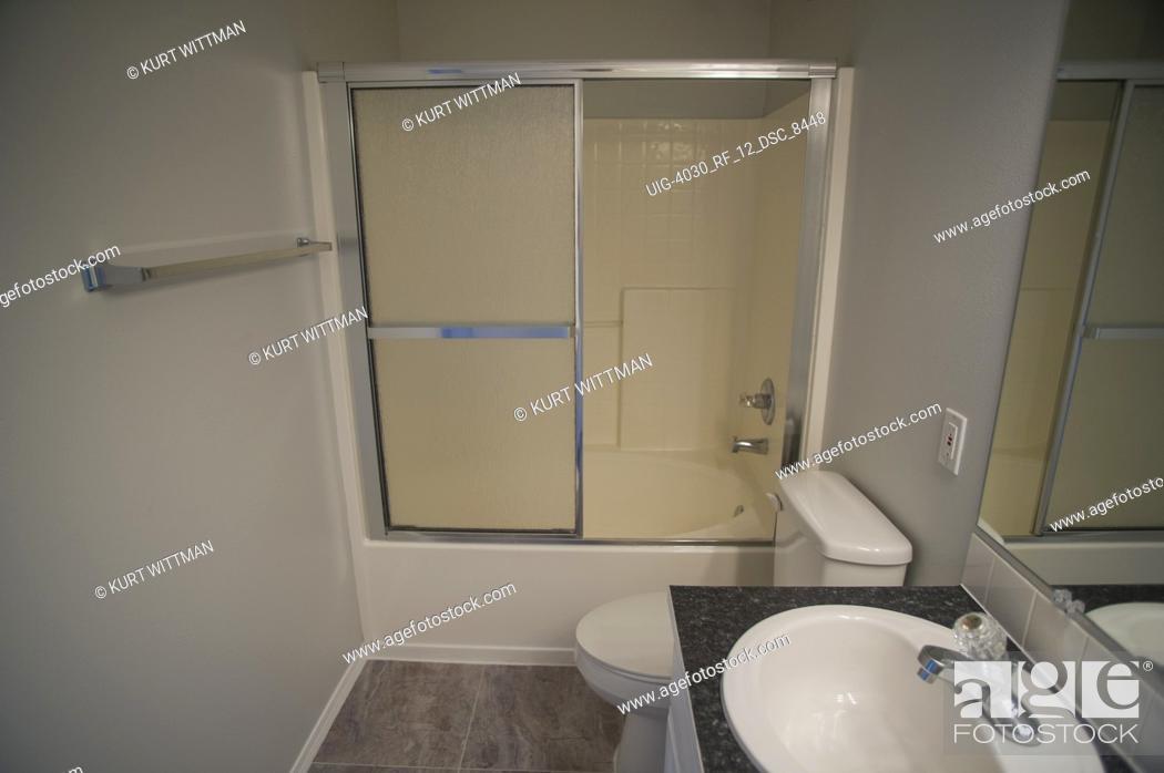 Stock Photo: No People, Horizontal, Indoors, Interior, Empty, Inside, House, Fresh, Mirror, Paint, Shower, Bathroom, Cabinet, Artificial, Sink, Residential, Suburb, Tile, Toilet, Wc, Suburban, Middle-Class, Renovate, Real Estate, Private Property, Tungsten Light