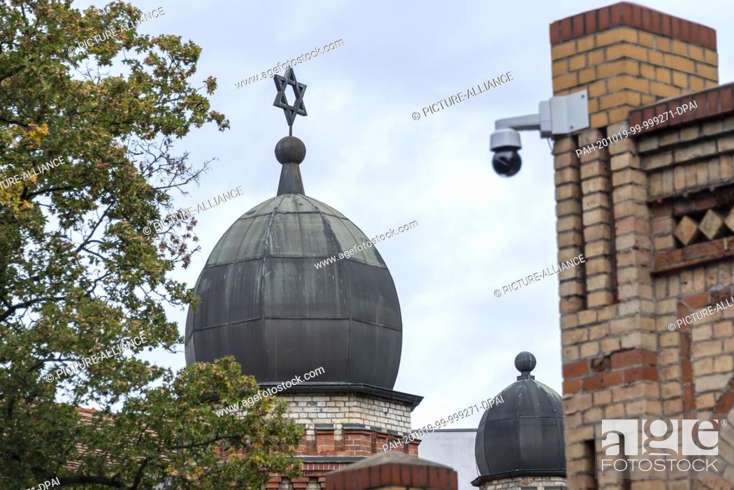 Stock Photo: 09 October 2020, Saxony-Anhalt, Halle: View of the synagogue in Halle. The building was originally built in 1894 as the Tahara House from white and yellow.