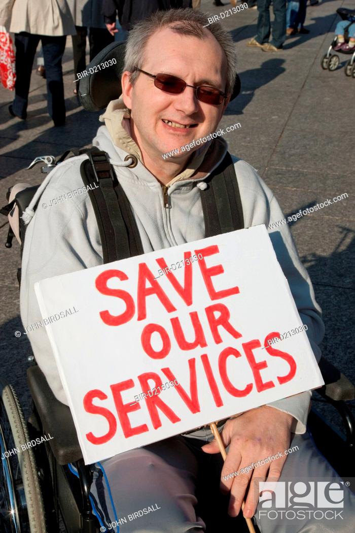 Stock Photo: Demonstration against Coalition cuts to disabled peoples services and income Wheelchair user.