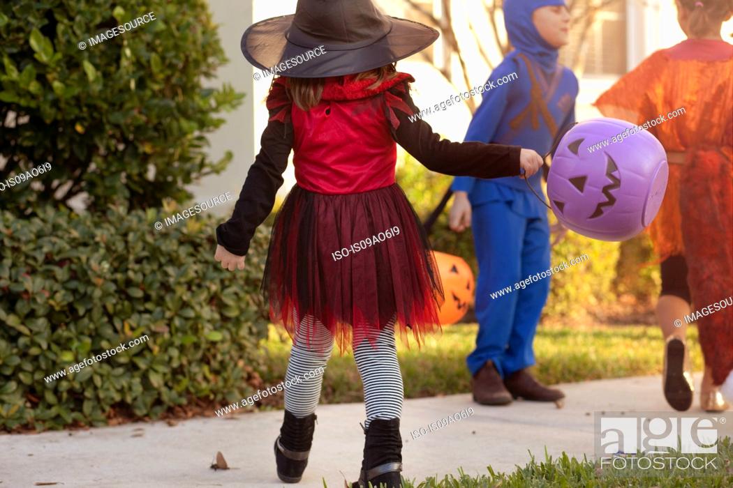 Stock Photo: Children going trick or treating.