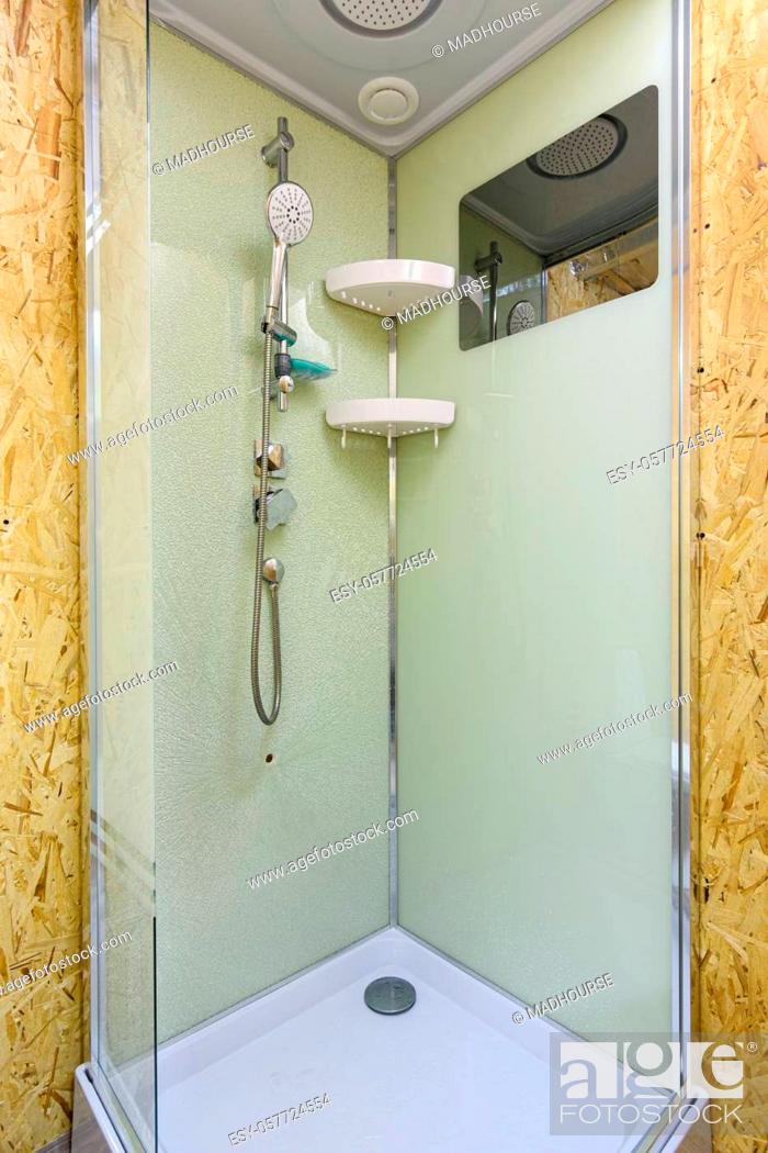 Stock Photo: Shower stall with cracked glass, located in a country house.