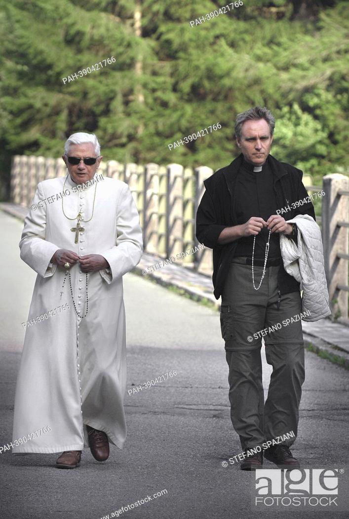 Stock Photo: Monsignor Georg Gaenswein. photo: Private walk of Pope Benedict XVI during his summer vacation, looks at the 'Centro Cadore' lake in Domegge.
