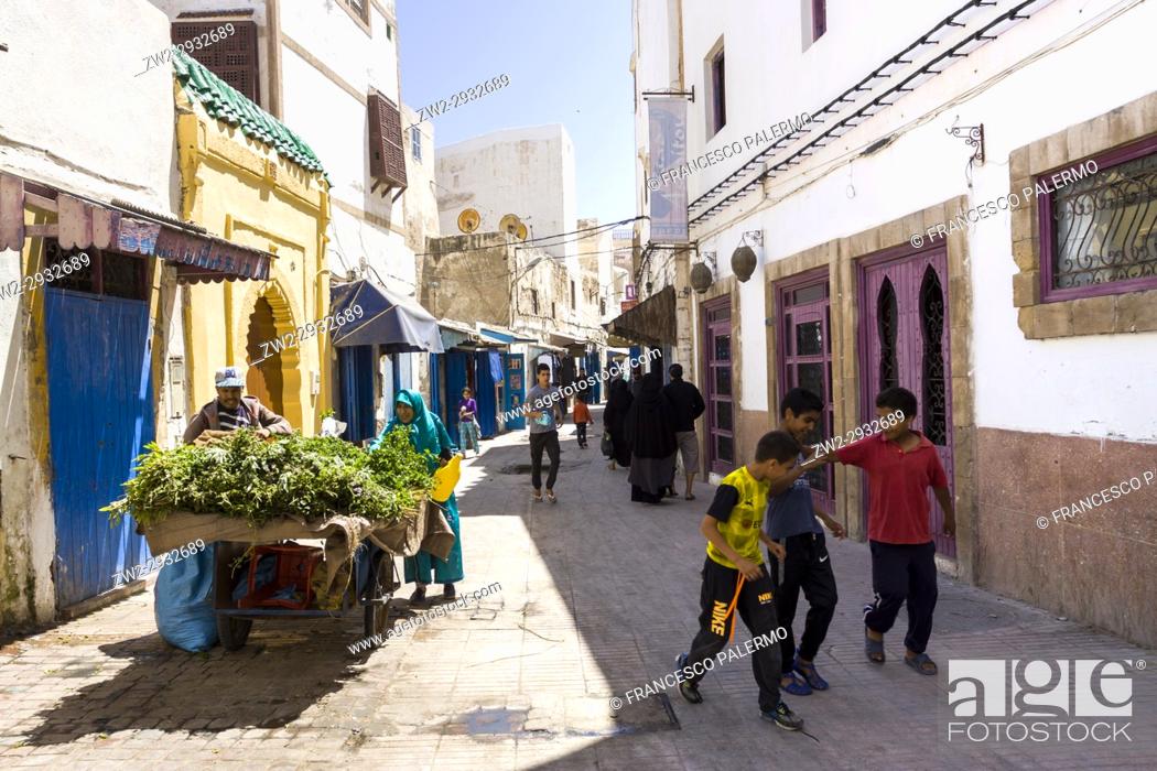 Stock Photo: White alley in a summer day. Essaouira, Marrakech-Safi. Morocco.