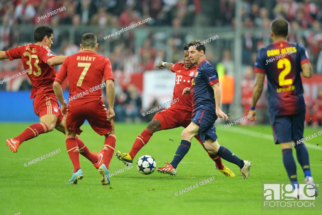 Stock Photo: Munich's Mario Gomez (L), Franck Ribéry, David Alaba and Barcelona's Lionel Messi vie for the ball during the UEFA Champions League semi final first leg soccer.
