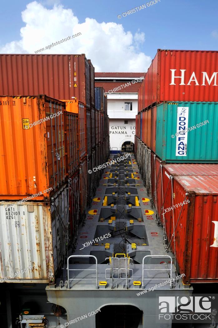 Stock Photo: container-ship crossing the Panama Canal Gatun locks, Republic of Panama, Central America.