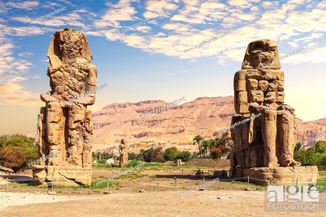Stock Photo: The Colossi of Memnon statues of the Pharaoh Amenhotep, Theban Necropolis, Luxor, Egypt.
