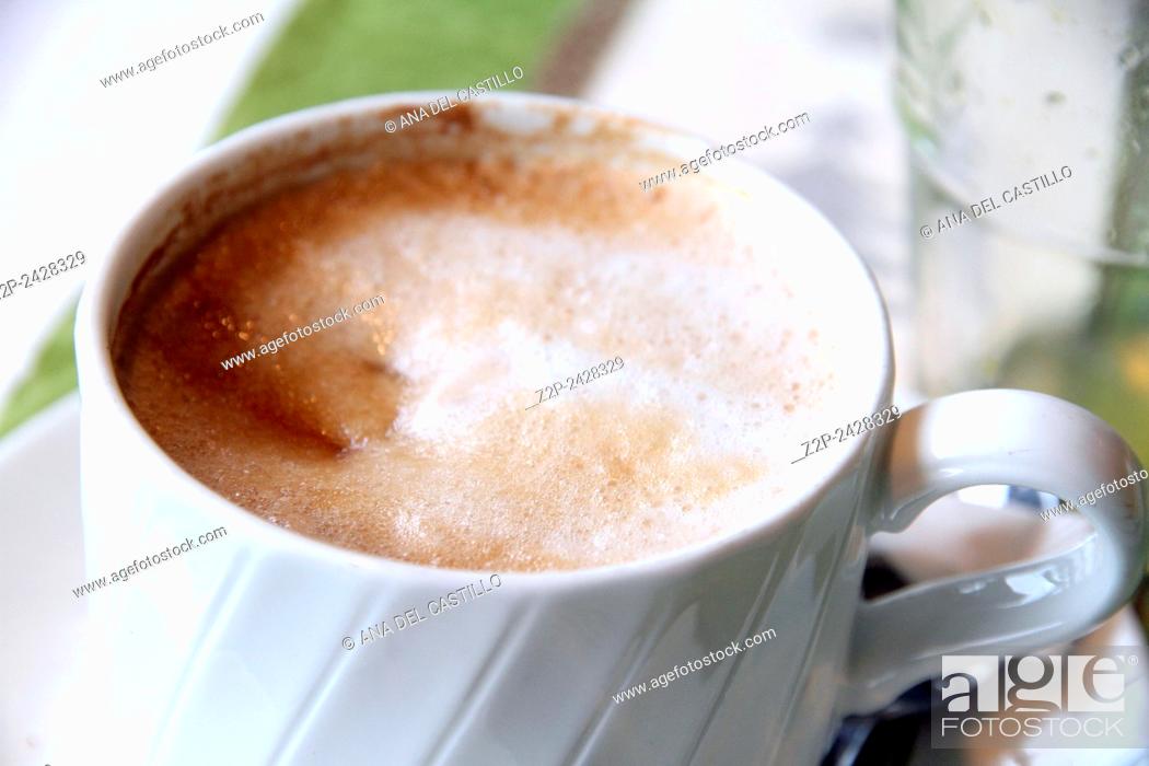 Stock Photo: Cappuccino cup on table Rome.