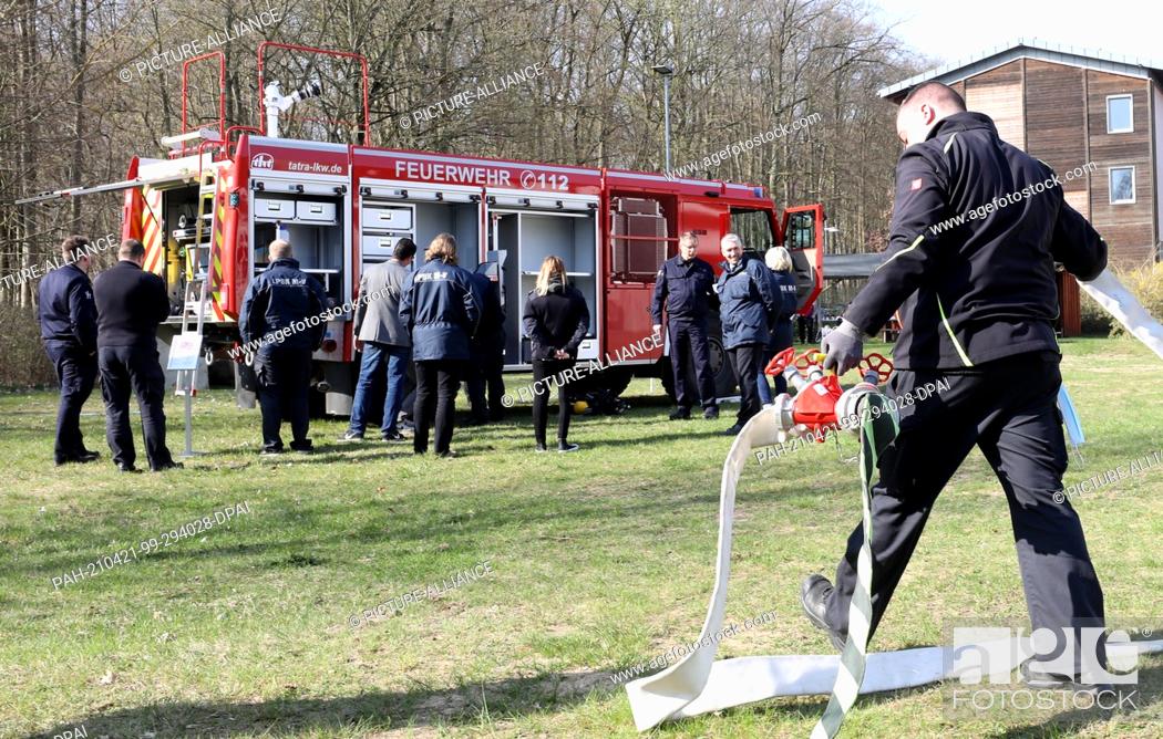 Stock Photo: 21 April 2021, Mecklenburg-Western Pomerania, Malchow: A new water tender is presented at a press event at the State Fire Brigade School.