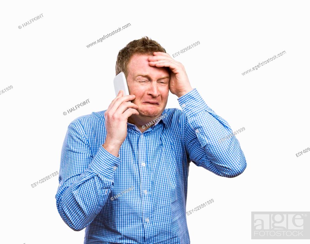 Man making funny faces while making a phone call. Studio shot on white  background, Stock Photo, Picture And Low Budget Royalty Free Image. Pic.  ESY-029561939 | agefotostock