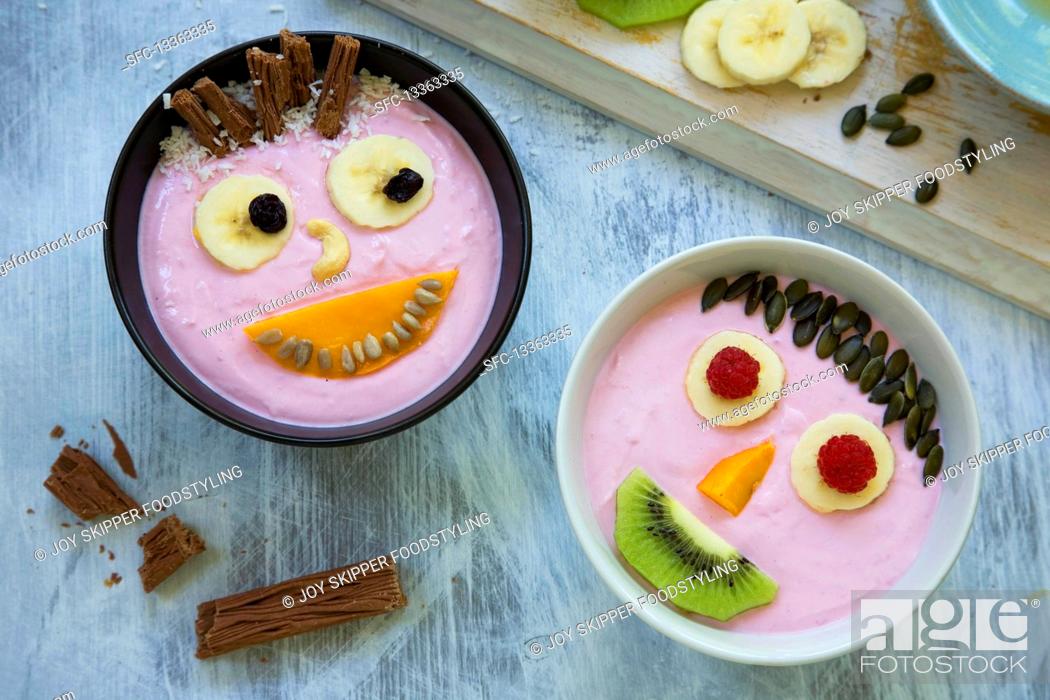Stock Photo: Smiley yoghurt faces.