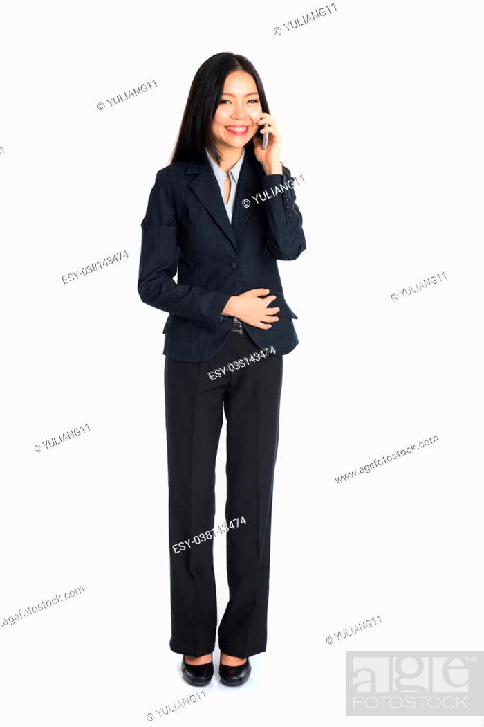 Stock Photo: Asian business woman on cellphone.