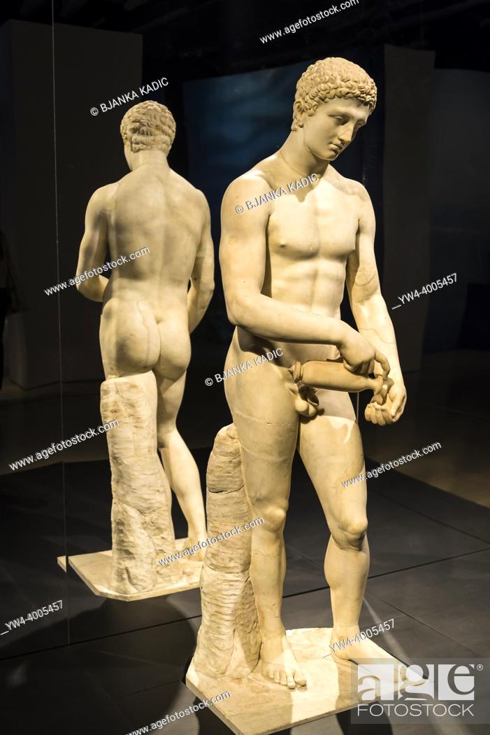 Stock Photo: Athlete preparing for a competition Roman sculpture, 125 CE, Ancient Greeks exhibition in Science Museum, London, England, UK.