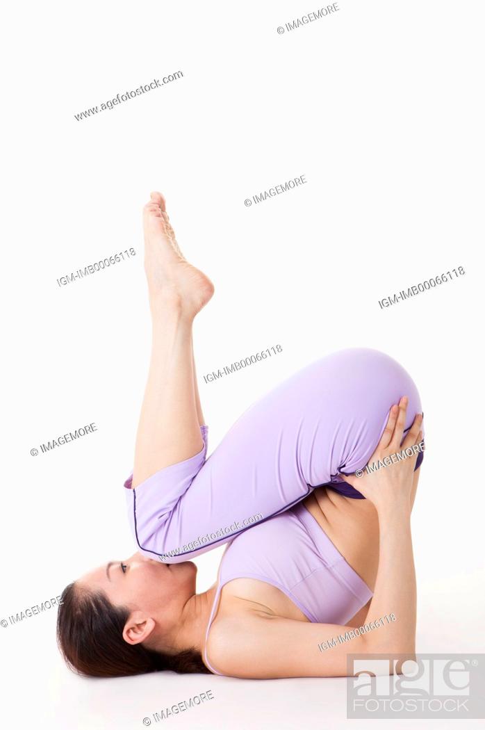 Hard Yoga Pose. a Man Stands on His Arms and Legs in the Air. Stock Photo -  Image of performance, balance: 200883710