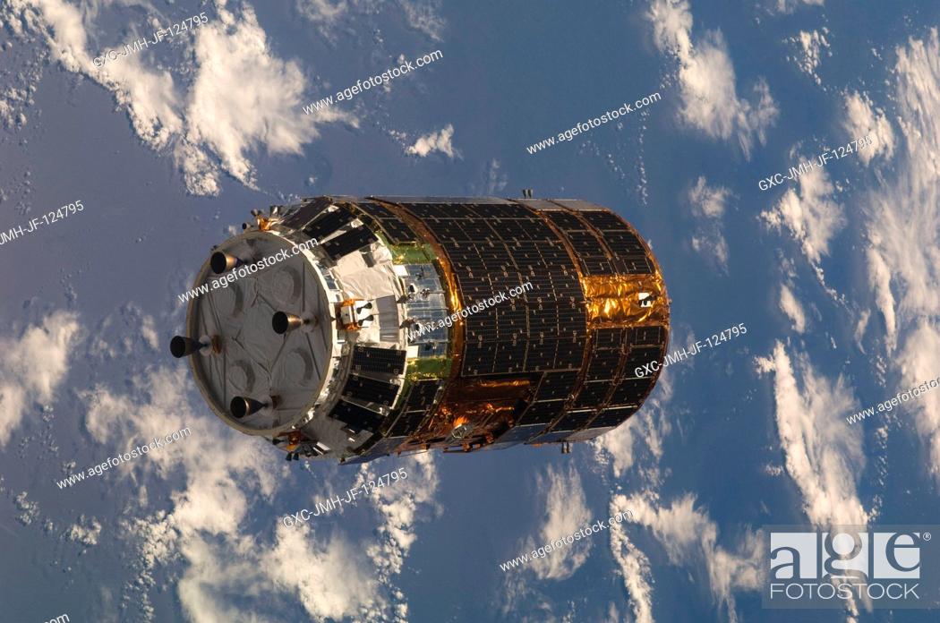 Stock Photo: Backdropped by a blue and white part of Earth, the unpiloted Japanese H-II Transfer Vehicle (HTV) approaches the International Space Station.