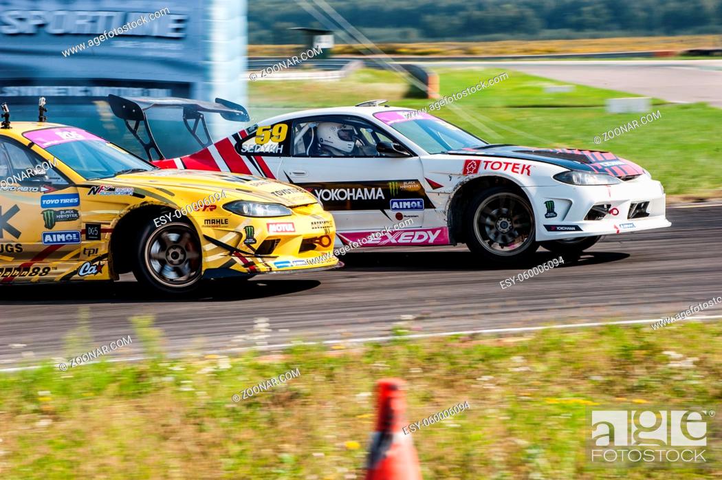 Stock Photo: Nizhny Novgorod Russia Aug 20, 2016 : Russian Drift Series Stage 5 RDS Zapad West Chivchyan George Gocha vs Ekaterina Sedykh. Nissan Silvia S15.