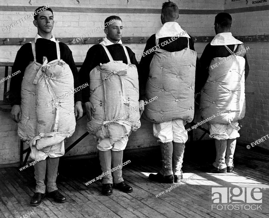Photo de stock: Navy recruits with their mattresses tied to them to serve as life preservers. Newport Naval Training Station, Rhode Island. World War I. April 1917.