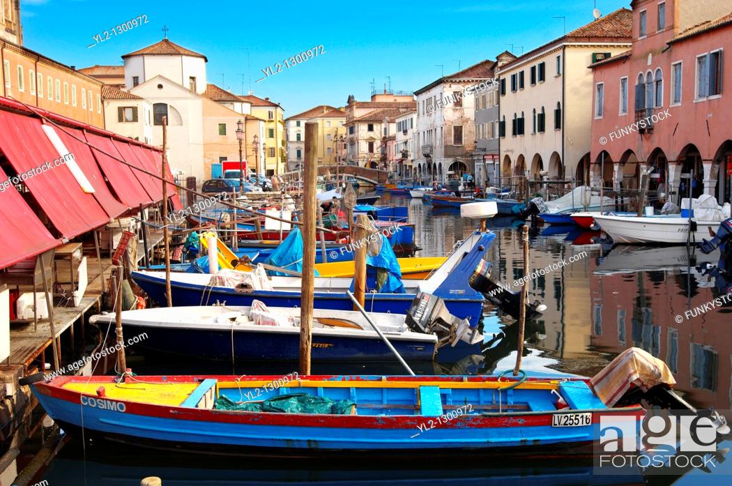 Stock Photo: Fishing Boats outside the fish market on Riva Vena canal - Chioggia - Venice - Italy.