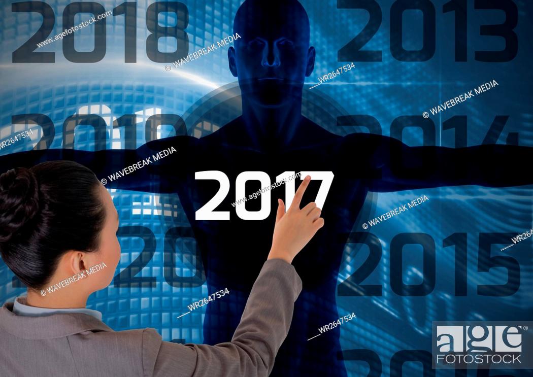 Stock Photo: Woman touching 2017 on 3D digitally generated human body silhouette.