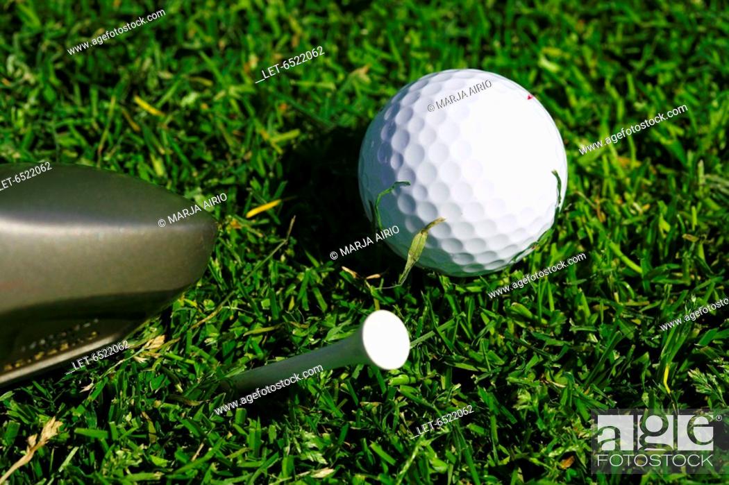 Stock Photo: A golf ball, a tee and a golf club  Meri-Teijo, Finland.