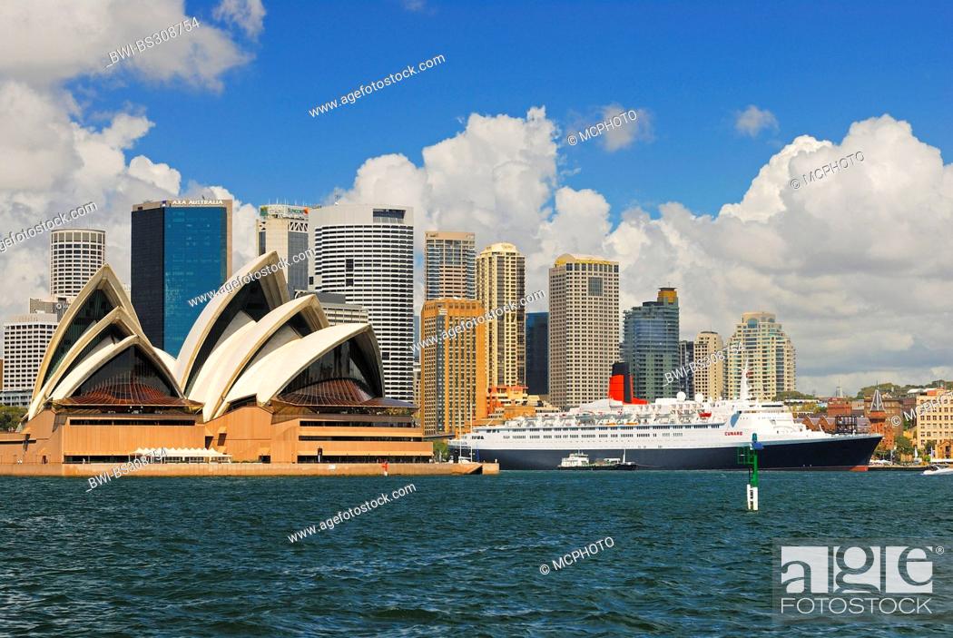 Stock Photo: Queen Elizabeth 2 ocean liner and Sydney Opera in front of the skyline of Sydney, Australia, New South Wales, Sydney.