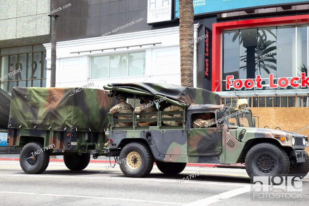 Stock Photo: Los Angeles, CA - June 2, 2020: National Guard patrols Hollywood Boulevard during the George Floyd Black Lives Matter Protest on June 2.