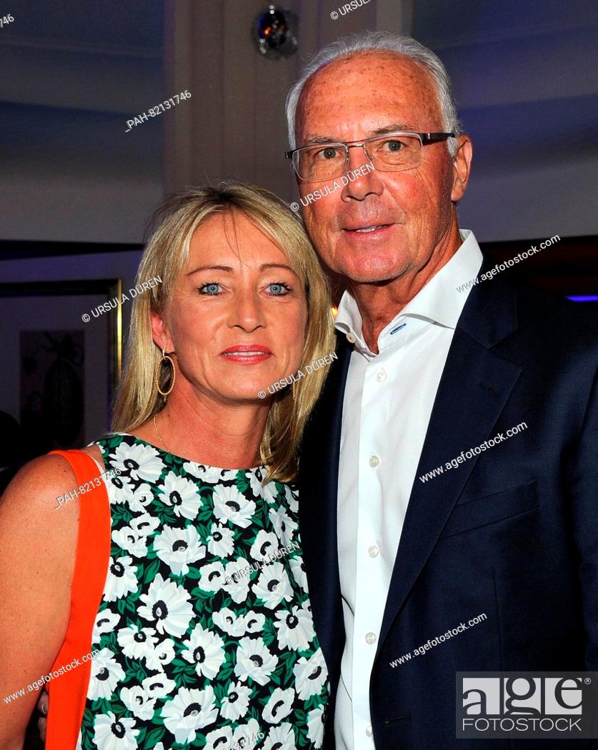 Stock Photo: Soccer legend Franz Beckenbauer and his wife Heidrun enjoying the gala that is being held as part of the 29th Kaiser Cup golf tournament.