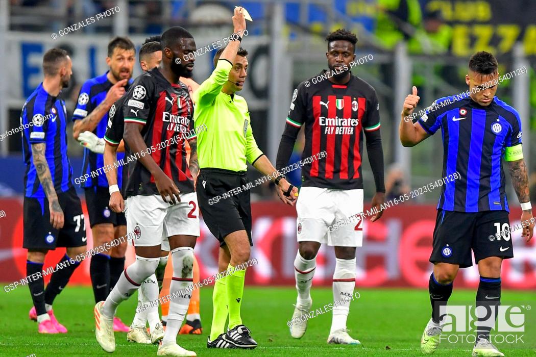 Stock Photo: Milano, Italy. 16th, May 2023. Referee Clement Turpin books Lautaro Martinez (10) of Inter during the UEFA Champions League match between Inter and AC Milan at.