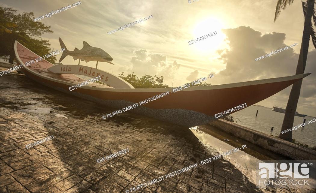 Stock Photo: Monument in the form of a boat containing the inscription ""Isla Mujeres""".