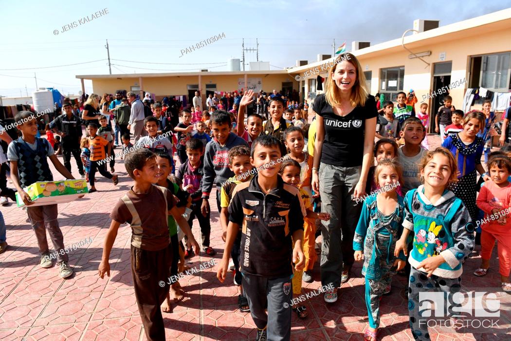 Stock Photo: EXCLUSIVE - UNICEF ambassador Eva Padberg is surrounded by refugee children in the Debaga refugee camp between Mosul and Erbil, Iraq, 18 October 2016.