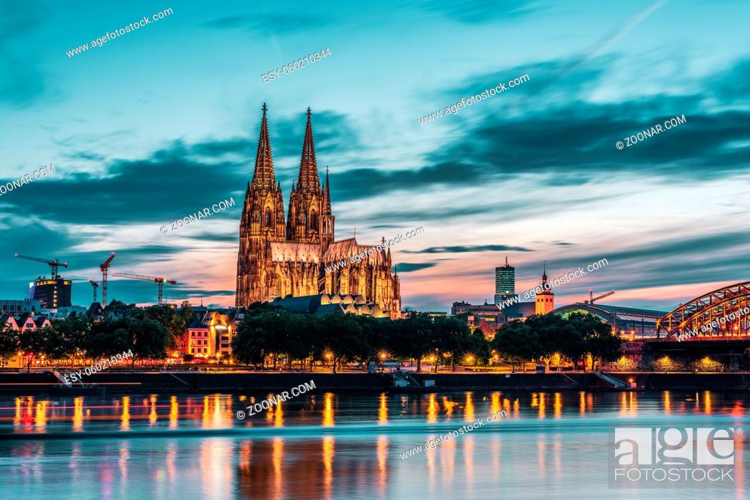 Stock Photo: Panoramic view of Cologne Cathedral at the blue hour, Germany.