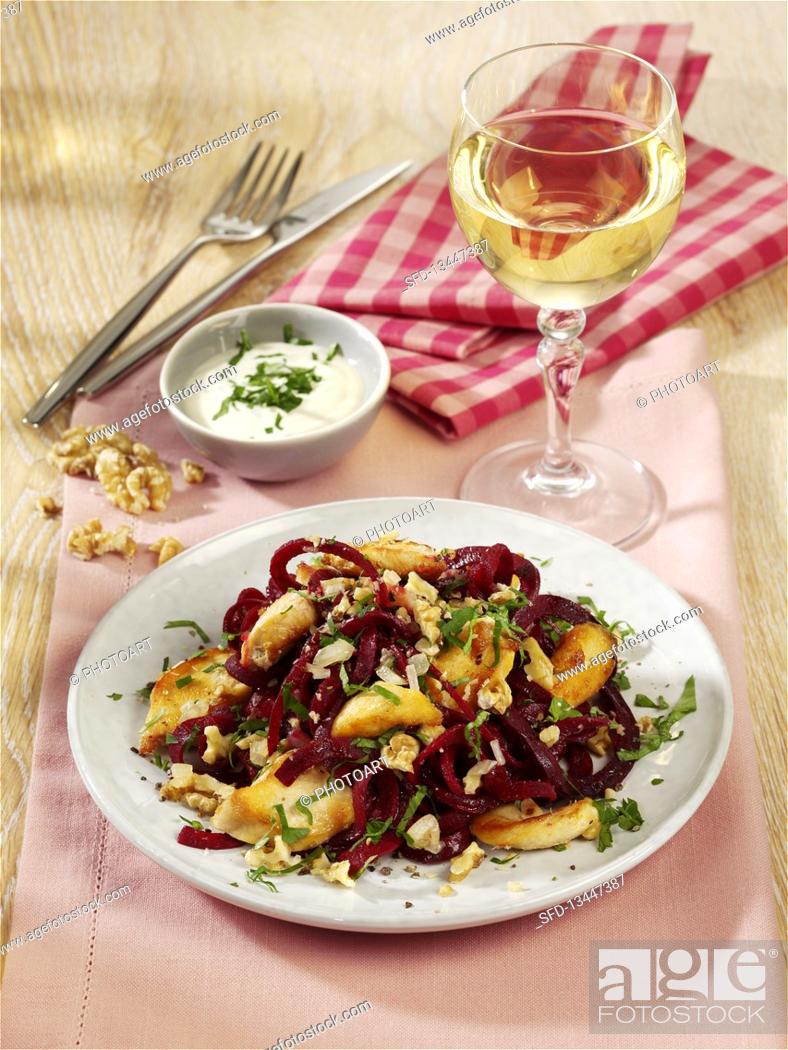 Stock Photo: Salad with beetroot noodles, chicken breast and goat's cheese.