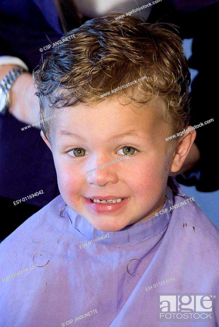 young boy with wet hair, is getting is hair cut at a barber shop, Stock  Photo, Picture And Low Budget Royalty Free Image. Pic. ESY-011694042 |  agefotostock