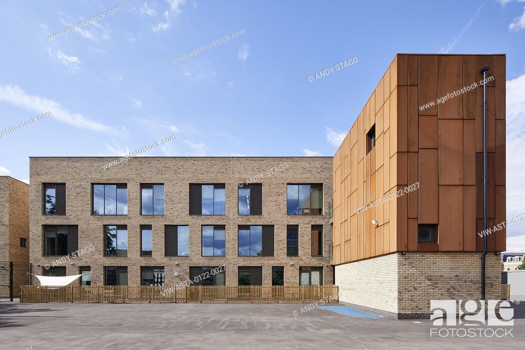 Stock Photo: Joint of brick and Cor-ten facades and playground area. Olga Primary School, London, United Kingdom. Architect: Architecture Initiative, 2017.