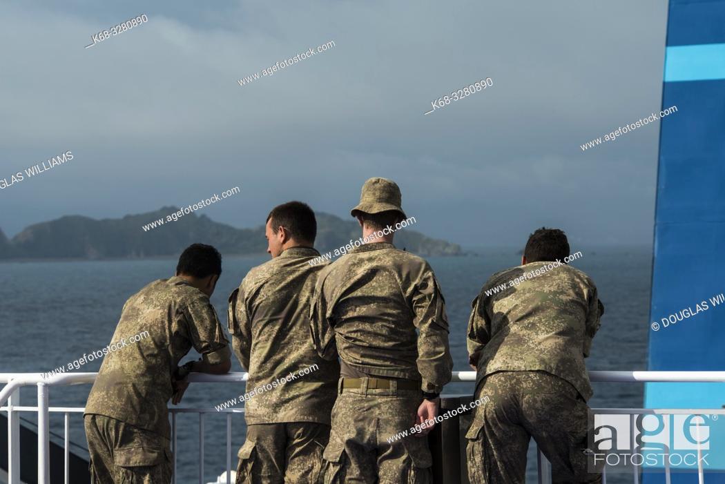 Stock Photo: New Zealand soldiers on the ferry from Wellington to Picton, New Zealand.