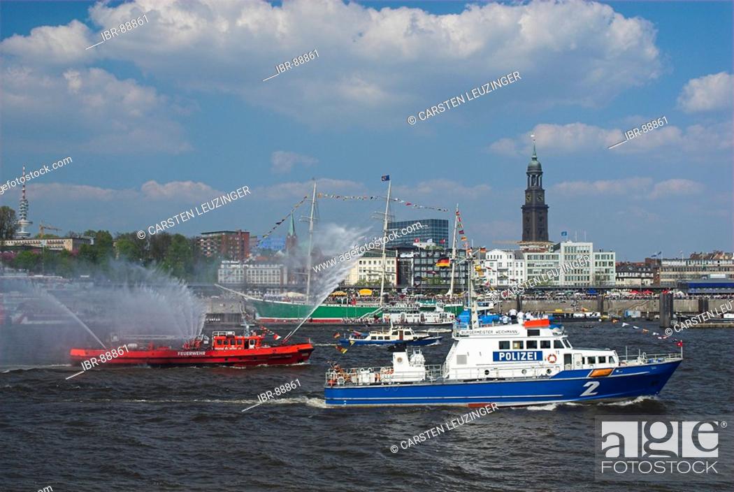Stock Photo: A police boat and a fire boat in Hamburg during the 817th anniversary of Hamburg Harbour, Hamburg, Germany.