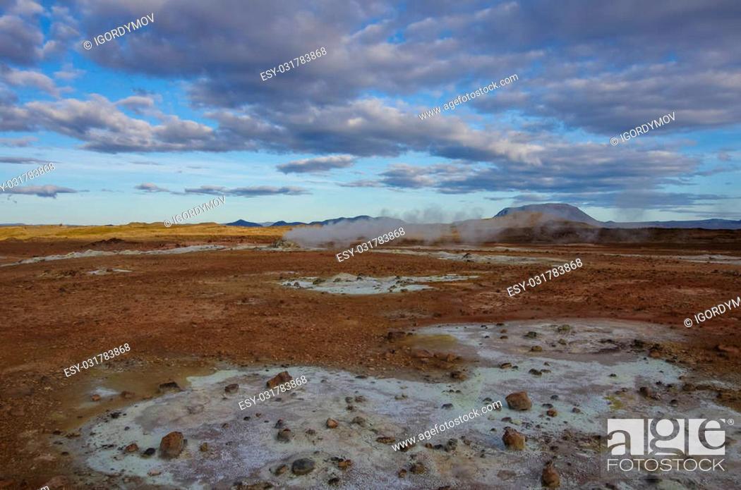 Stock Photo: Hverarond geothermal field in Iceland. This is a field in Krafla caldera area near Mvatmn Lake which is full of mudpots, steam vents, sulphur deposits.