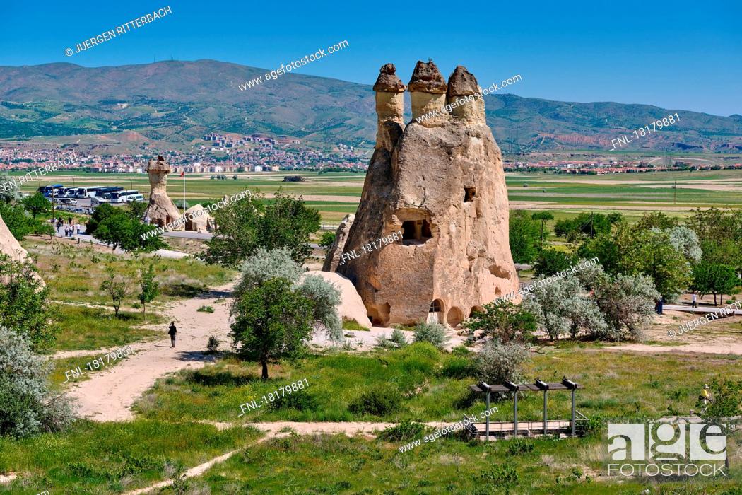 Stock Photo: Picturesque landscape of shaped sandstone rocks. Famous Fairy Chimneys or Multihead stone mushrooms in Pasabagi Valley, Goreme, Cappadocia, Anatolia.