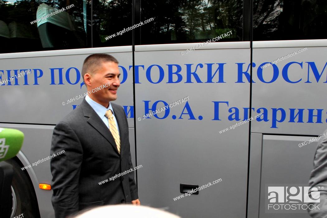 Stock Photo: At the Gagarin Cosmonaut Training Center in Star City, Russia, Expedition 4445 crewmember Kjell Lindgren of NASA prepares to board a bus July 10 for his.