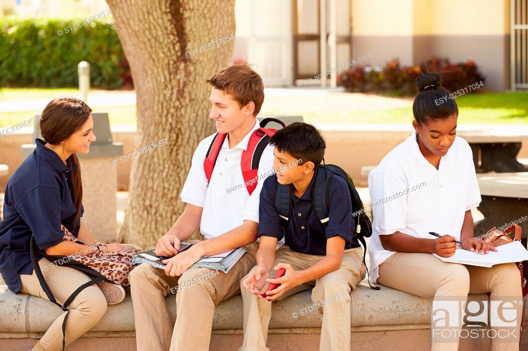 Stock Photo: High School Students Hanging Out On School Campus.
