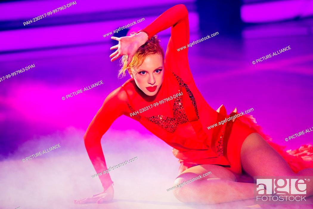 Stock Photo: 17 March 2023, North Rhine-Westphalia, Cologne: Anna Ermakova, model, and Lusin, professional dancer, dance in the RTL dance show ""Let's Dance"" at the.