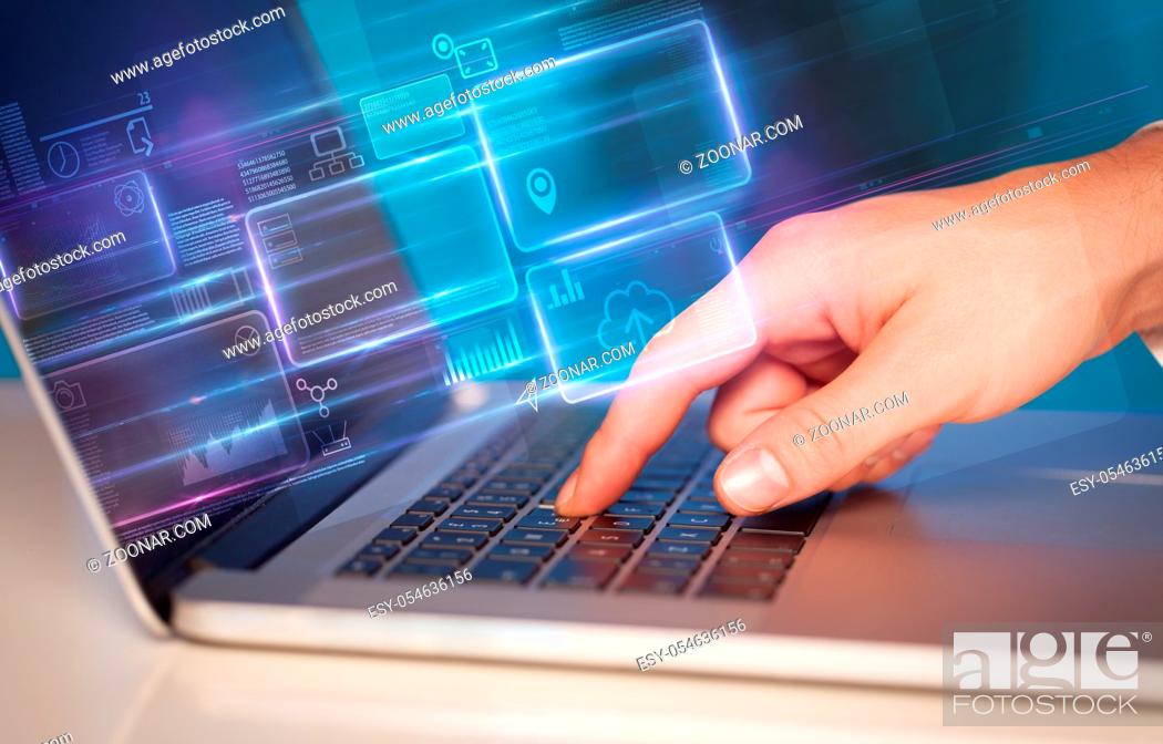 Stock Photo: Hand using laptop with database reports and online work concept.