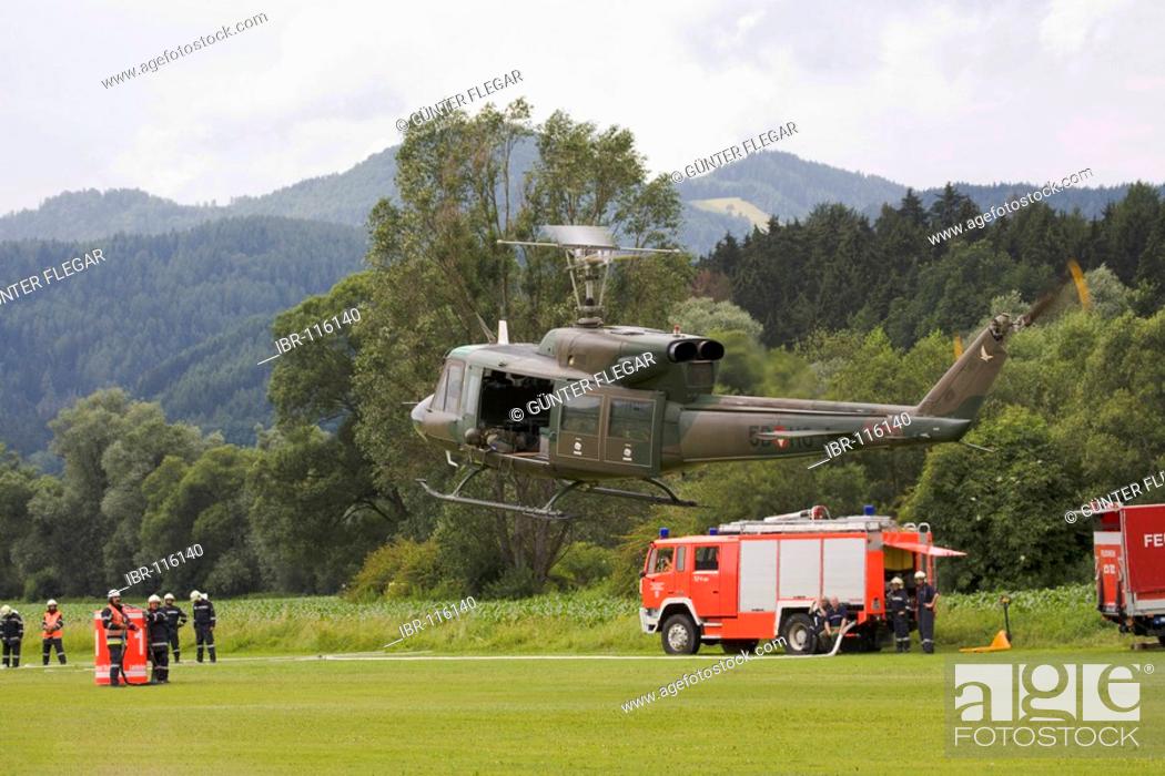 Stock Photo: Assistance helicopter Augusta Bell 212 of the Austrian federal army prepares itself for a fire-fighting operation Kapfenberg, Styria, Austria.