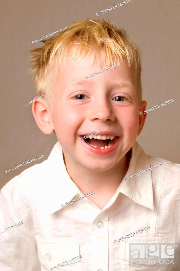 A five-year-old blonde-haired, blue eyed boy is laughing and looking  straight at the camera, Stock Photo, Picture And Rights Managed Image. Pic.  XA6-698066 | agefotostock