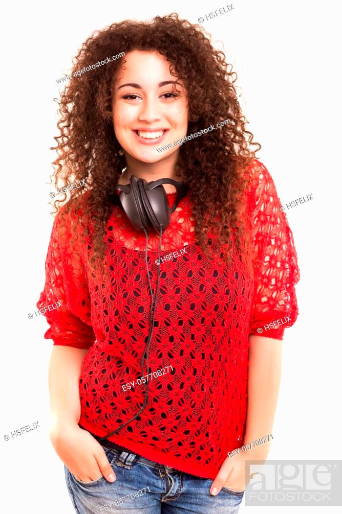 Stock Photo: Young and beautiful woman listening to music.