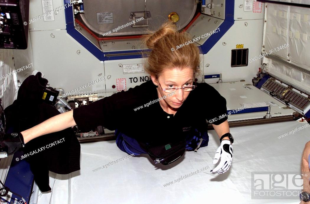 Stock Photo: Astronaut Marsha S. Ivins, STS-98 mission specialist, floats into the newly attached Destiny laboratory onboard the International Space Station (ISS).