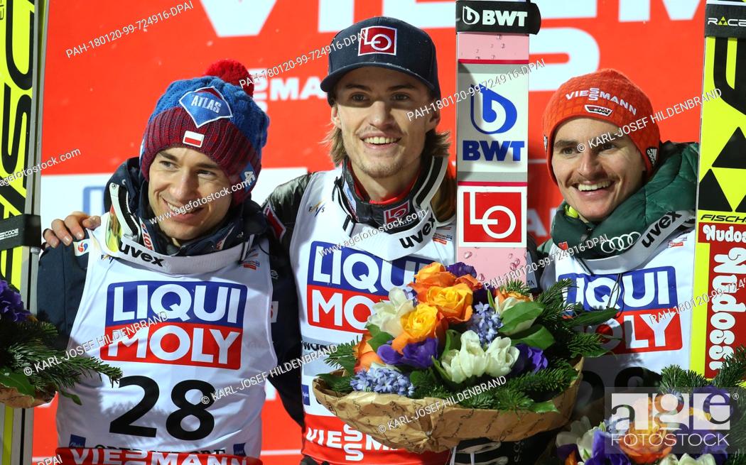 Stock Photo: Kamil Stoch of Poland (Silver - l-r), Daniel Andre Tande of Norway (Gold) and Richard Freitag of Germany (Bronze) on the podium at the victory ceremony of the.